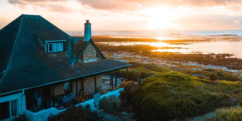 aerial view of coastal home near cape town at sunset
